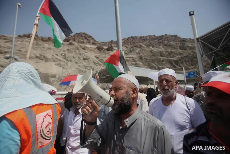Muslim pilgrims arrive to cast stones at a pillar, symbolizing the stoning of Satan, in a ritual called "Jamarat," a rite of the annual hajj, in Mina near the holy city of Mecca on October 06, 2014. The pilgrims perform...