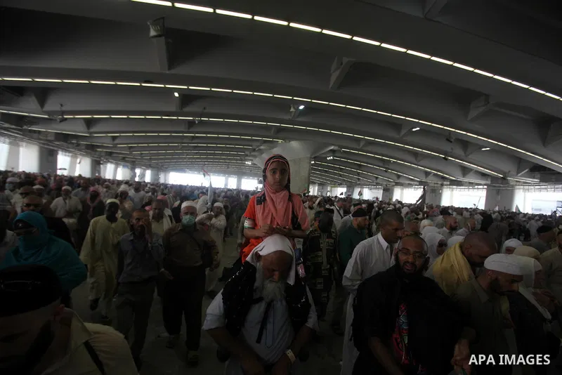 Muslim pilgrims arrive to cast stones at a pillar, symbolizing the stoning of Satan, in a ritual called "Jamarat," a rite of the annual hajj, in Mina near the holy city of Mecca on October 06, 2014. The pilgrims perform...