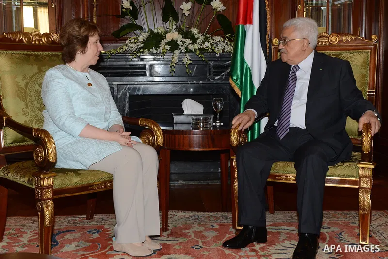 Palestinian president Mahmud Abbas (R) meets with EU Commissioner Catherine Ashton on the sidelines of the opening session of the Gaza Donor Conference in Cairo on October 12, 2014, aimed at helping the Gaza Strip pummel...