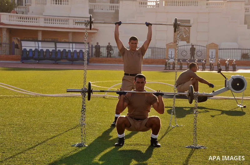 Egyptian policemen show their skills during a military show in Cairo, Egypt, on October 21, 2014. apaimages/Egyptian Presidency