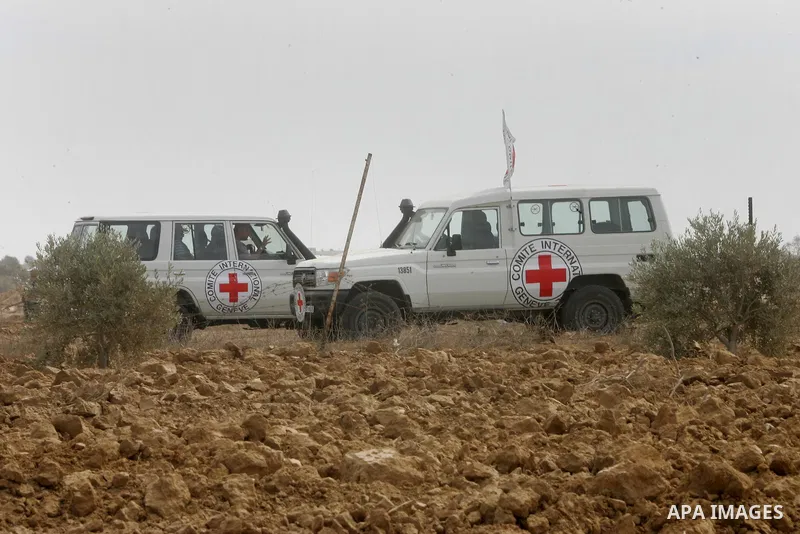 Vehicle of International Committee of the Red Cross (ICRC) driven, as the comittee assists Palestinian farmers to repair their fields that were devastated during the Israeli army summer's military offensive on the Gaza S...