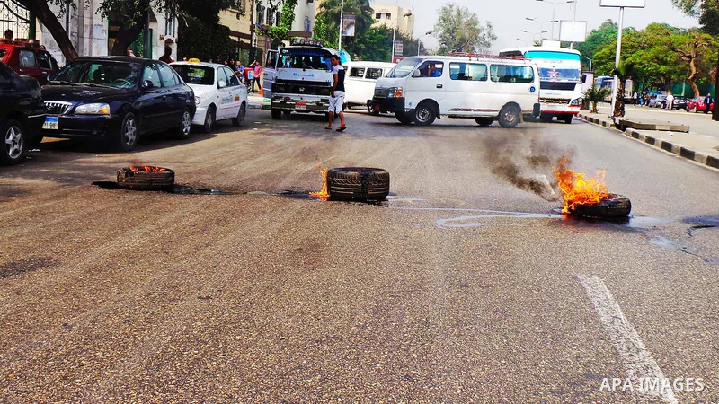 Egyptian students who support Muslim Brotherhood and ousted president Mohammed Morsi, blocked the road to the college of Agriculture during a demonstration against military rule, at Cairo University, in Cairo, October 22...