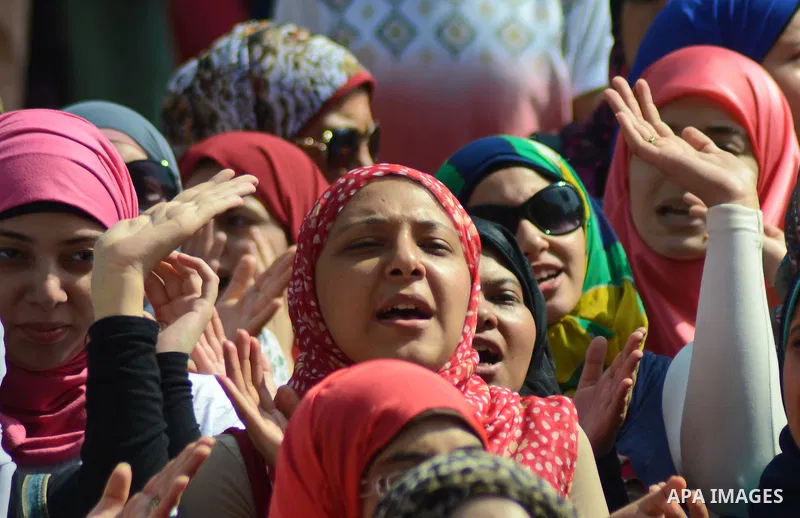 Egyptian students shot slogans during a demonstration to demand their rights at Cairo University, in Cairo, Eygpt, on Oct. 26, 2014. Photo by Amr Sayed
