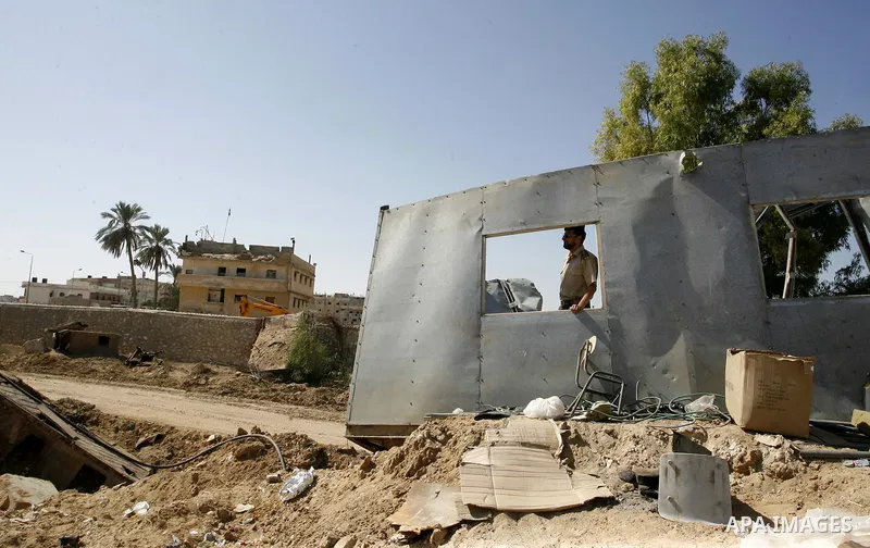 A Palestinian security officer stands at the Palestinian side of the Rafah border crossing in the southern Gaza Strip with Egypt on October 26, 2014. The decision was taken to close the Rafah crossing into the Gaza Strip...