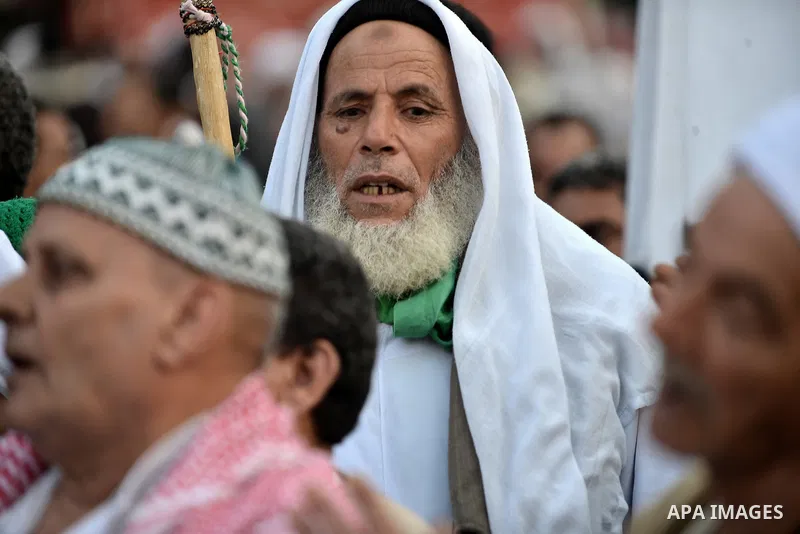Members of Egyptian sufi muslim group perform as they parade the street during a ritual to commemorate the Hijri New Year, also known as Islamic New Year, in Cairo on October 26, 2014. The Islamic year lasts for about 35...