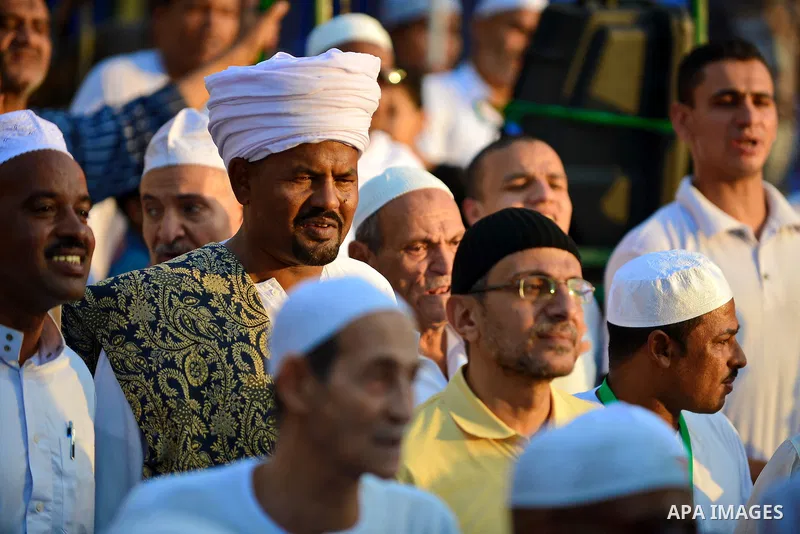 Members of Egyptian sufi muslim group parade the street during a ritual to commemorate the Hijri New Year, also known as Islamic New Year, in Cairo on October 26, 2014. The Islamic year lasts for about 354 days and consi...