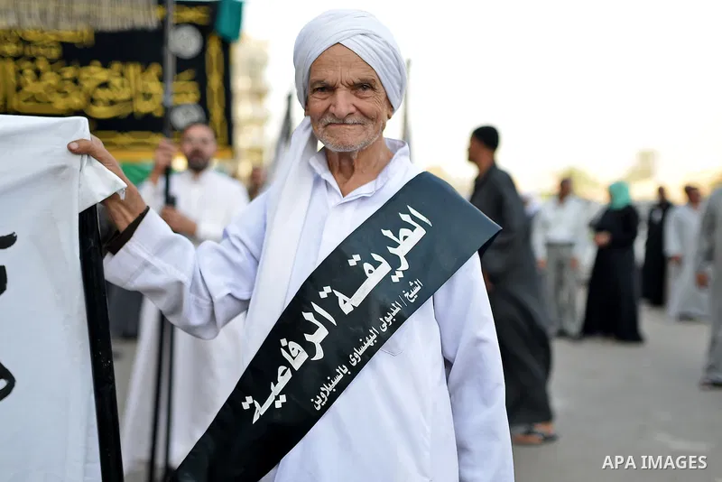 Members of Egyptian sufi muslim group parade the street during a ritual to commemorate the Hijri New Year, also known as Islamic New Year, in Cairo on October 26, 2014. The Islamic year lasts for about 354 days and consi...