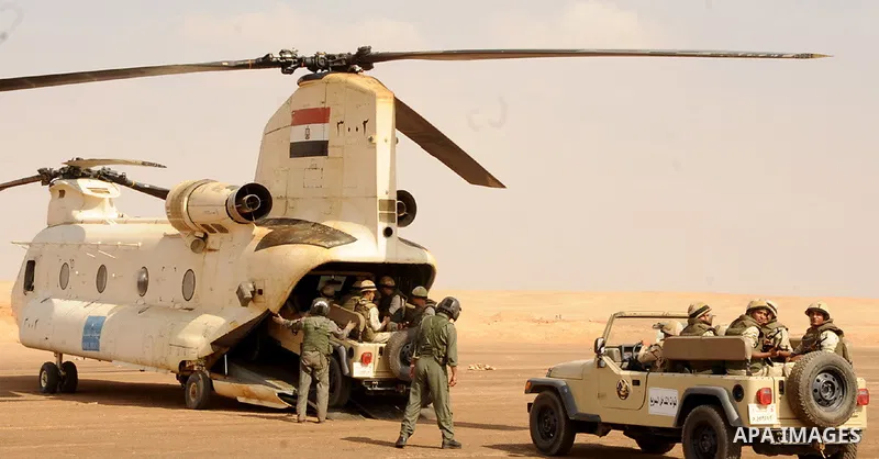 Military helicopters and soldiers of Egyptian Armed Forces are seen as Egypt reinforces its 2. and 3. armies in the Sinai Peninsula, Egypt on October 27, 2014. Pool / Egyptian Armed Forces / apaimages