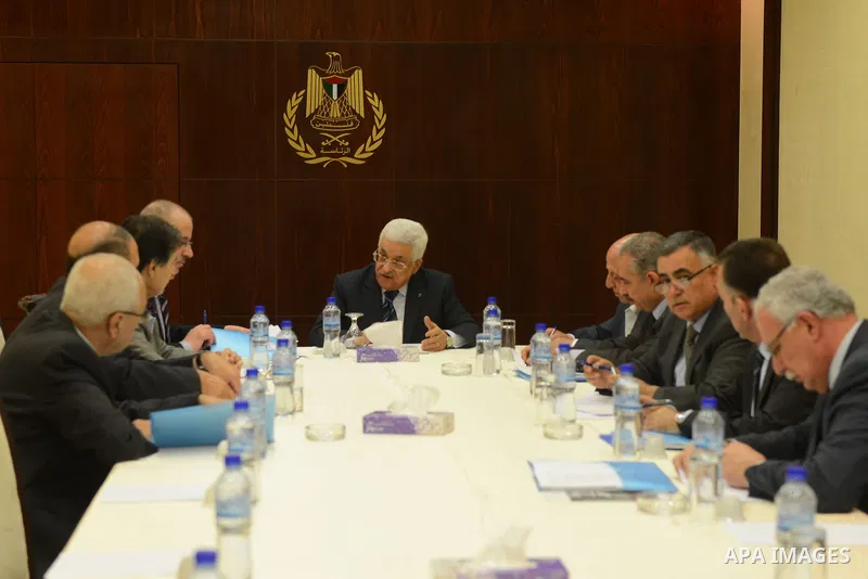 Palestinian President Mahmoud Abbas meets with the committee of Jerusalem, at Abbas's headquarter in the West Bank city of Ramallah, October 28, 2014. Photo by Thaer Ganaim