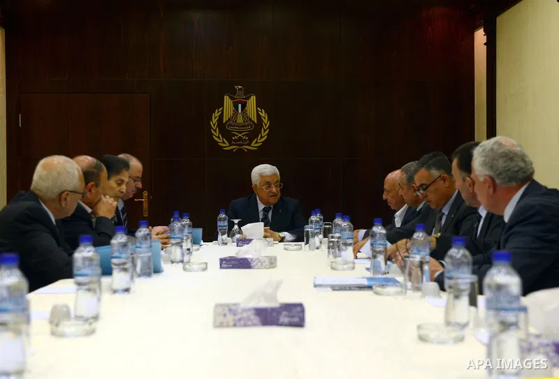 Palestinian President Mahmoud Abbas meets with the committee of Jerusalem, at Abbas's headquarter in the West Bank city of Ramallah, October 28, 2014. Photo by Thaer Ganaim