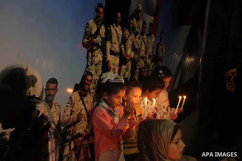 Palestinians light candles to mourn victims of the Egyptian soldiers killed in a suicide attack in Sinai on Friday, at the Egyptian community headquarter in Gaza city October 28, 2014. Cairo shut the vital crossing follo...