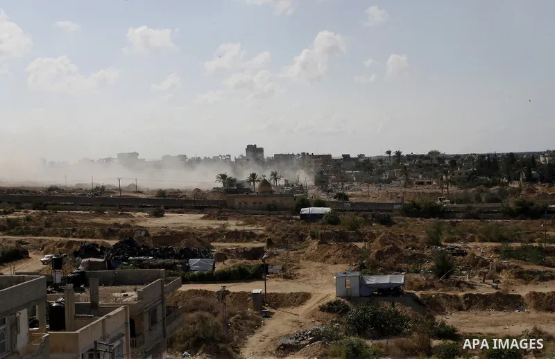 Smoke rises after a house was blown up during a military operation by Egyptian security forces in the Egyptian city of Rafah near the border with southern Gaza Strip October 29, 2014, as Egypt began setting up a buffer z...