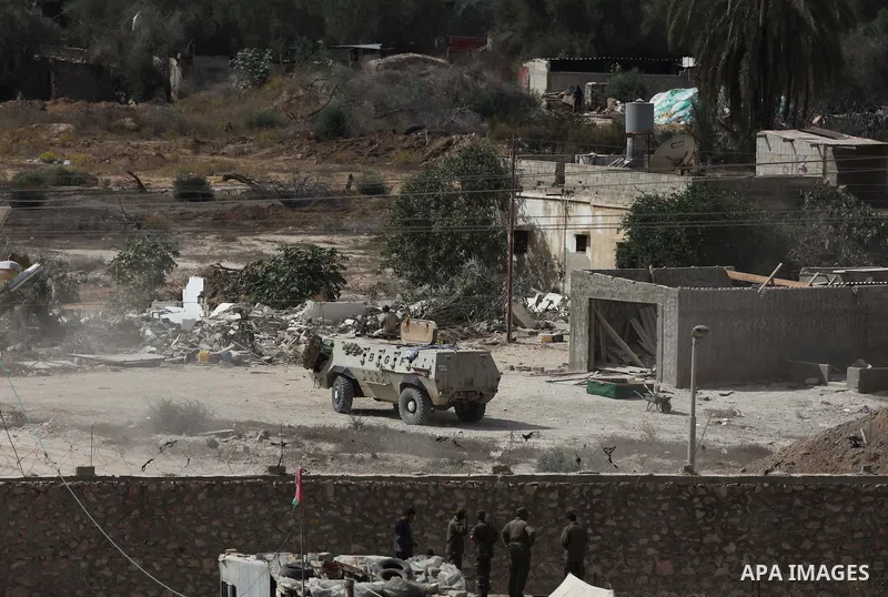 Egyptian soldiers take part in a military operation in the Egyptian city of Rafah, near the border with the southern Gaza Strip on October 30, 2014, as Egypt began setting up a buffer zone along the border with the Hamas...