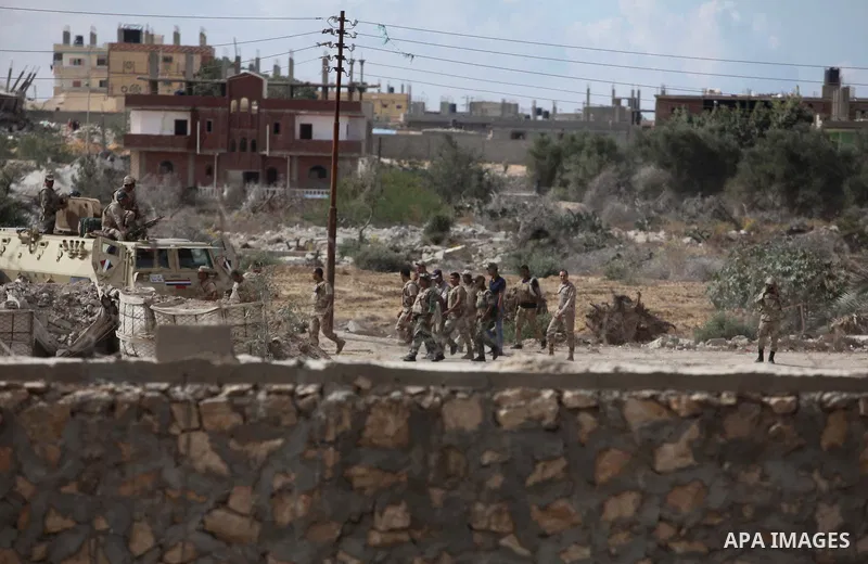 Egyptian soldiers take part in a military operation in the Egyptian city of Rafah, near the border with the southern Gaza Strip on October 30, 2014, as Egypt began setting up a buffer zone along the border with the Hamas...