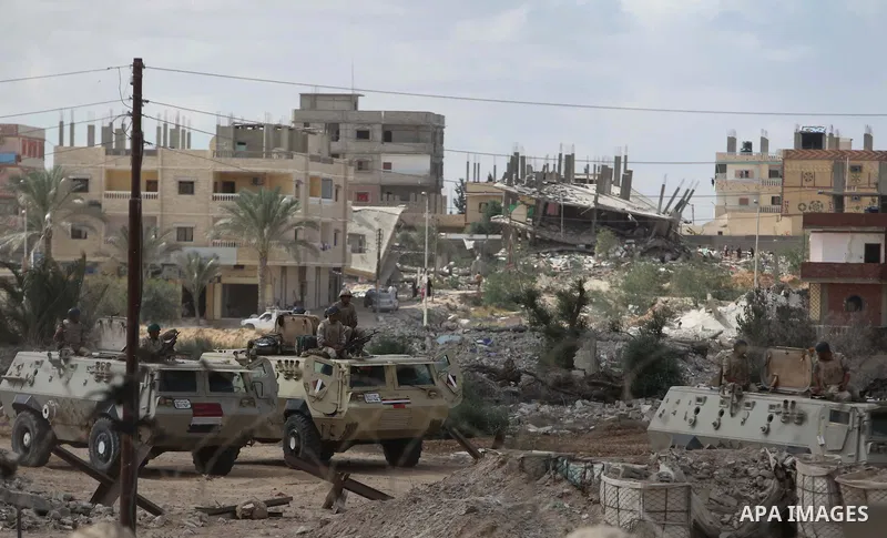 Egyptian soldiers take part in a military operation in the Egyptian city of Rafah, near the border with the southern Gaza Strip on October 30, 2014, as Egypt began setting up a buffer zone along the border with the Hamas...