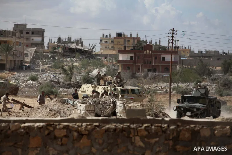 Egyptian soldiers take part in a military operation in the Egyptian city of Rafah, near the border with the southern Gaza Strip on October 30, 2014, as Egypt began setting up a buffer zone along the border with the Hamas...