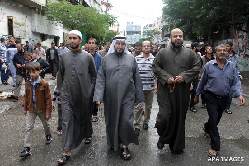 Palestinian Hamas supporters take part in a demonstration against Israeli restrictions at the Al-Aqsa Mosque compound, and in solidarity with the people in Jerusalem, in Jabalia in the northern Gaza Strip, October 31, 20...
