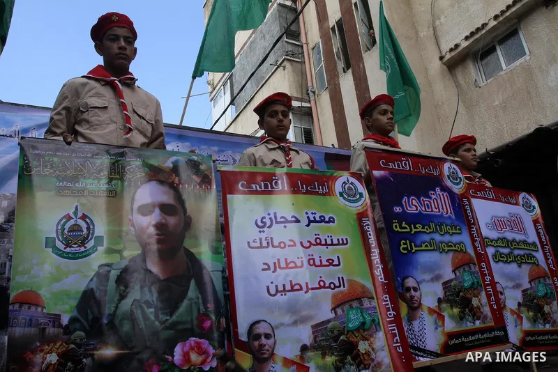 Palestinian Hamas supporters take part in a demonstration against Israeli restrictions at the Al-Aqsa Mosque compound, and in solidarity with the people in Jerusalem, in Jabalia in the northern Gaza Strip, October 31, 20...