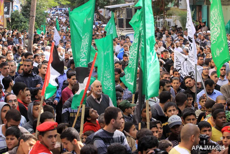 Palestinian Hamas supporters take part in a demonstration against Israeli restrictions at the Al-Aqsa Mosque compound, and in solidarity with the people in Jerusalem, in Jabalia in the northern Gaza Strip, October 31, 20...