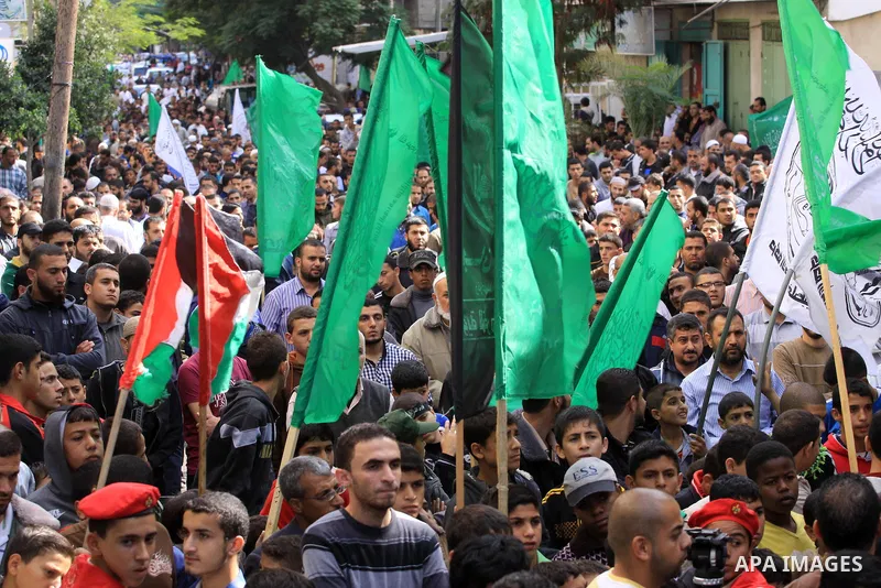 Palestinian Hamas supporters take part in a demonstration against Israeli restrictions at the Al-Aqsa Mosque compound, and in solidarity with the people in Jerusalem, in Jabalia in the northern Gaza Strip, October 31, 20...