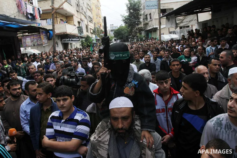 Palestinian Hamas supporters take part in a demonstration against Israeli restrictions at the Al-Aqsa Mosque compound, and in solidarity with the people in Jerusalem, in Jabalia in the northern Gaza Strip, October 31, 20...