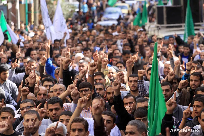 Palestinian Hamas supporters take part in a demonstration against Israeli restrictions at the Al-Aqsa Mosque compound, and in solidarity with the people in Jerusalem, in Jabalia in the northern Gaza Strip, October 31, 20...