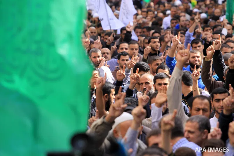Palestinian Hamas supporters take part in a demonstration against Israeli restrictions at the Al-Aqsa Mosque compound, and in solidarity with the people in Jerusalem, in Jabalia in the northern Gaza Strip, October 31, 20...