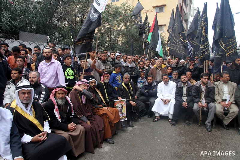 Palestinian Islamic Jihad movement supporters take part in a demonstration against Israeli restrictions at the Al-Aqsa Mosque compound, and in solidarity with the people in Jerusalem, in Gaza City October 31, 2014. Musli...