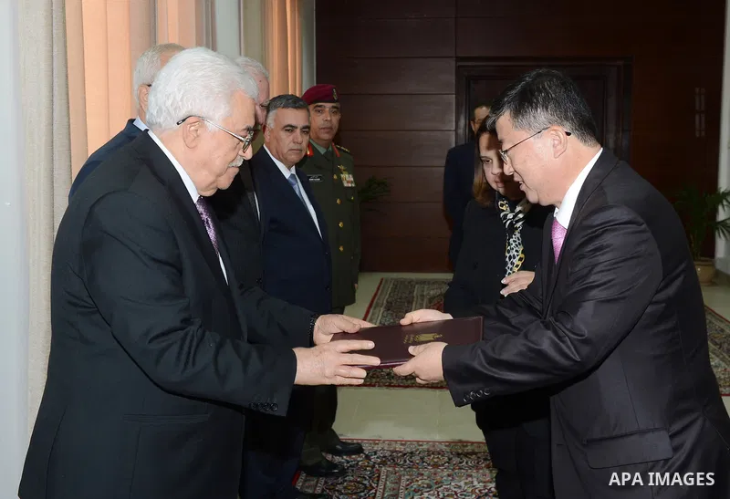 Palestinian President Mahmoud Abbas (Abu Mazen) accepts credentials from the representative of Korea to the State of Palestine in the West bank city of Ramallah, on Nov. 05, 2014. Photo by Thaer Ganaim