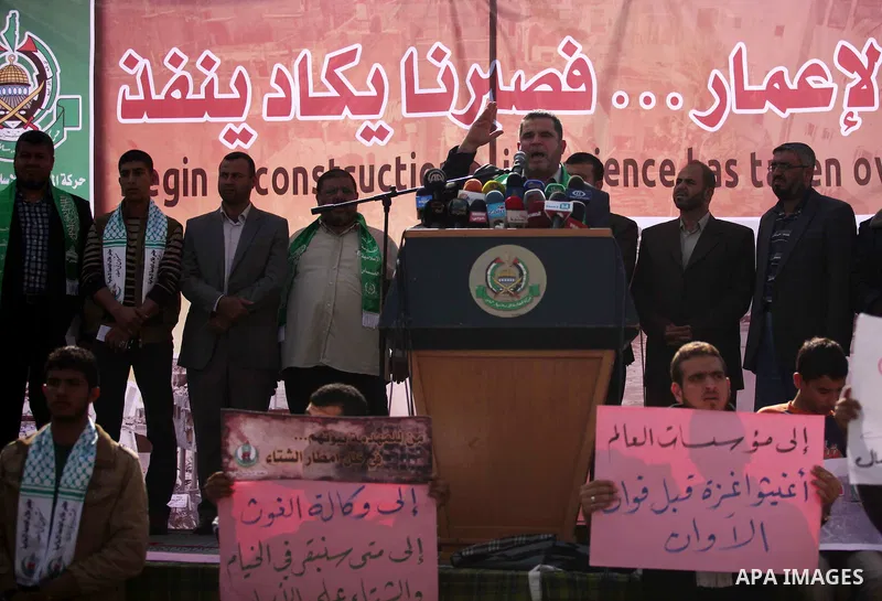 Senior Hamas leader Salah al-Bardawil, speaks during a protest organized by the owners of houses which was destroyed by Israeli shelling during the most recent conflict between Israel and Hamas, calling for reconstructio...