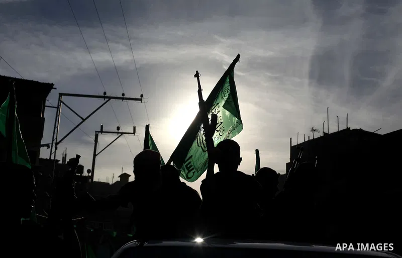 Young Palestinians from Hamas's "popular army" take part in a military graduation ceremony in Jabaliya refugee camp in the northern Gaza Strip November 7, 2014. Hamas recently formed a "popular army" for young Palestinia...