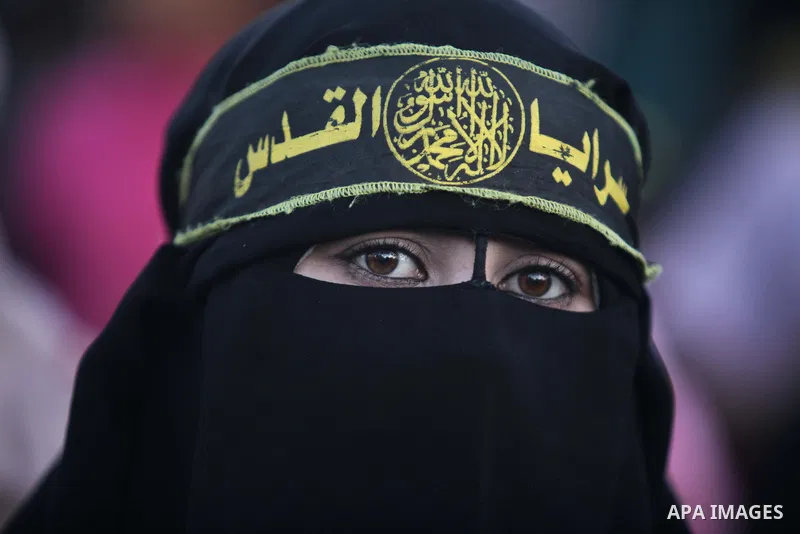 A Palestinian veiled woman who support Islamic Jihad movement attends a ceremony in solidarity with Jerusalem and against the recent visits by Jewish activists to al-Aqsa mosque, in Gaza city November 7, 2014. In recent...