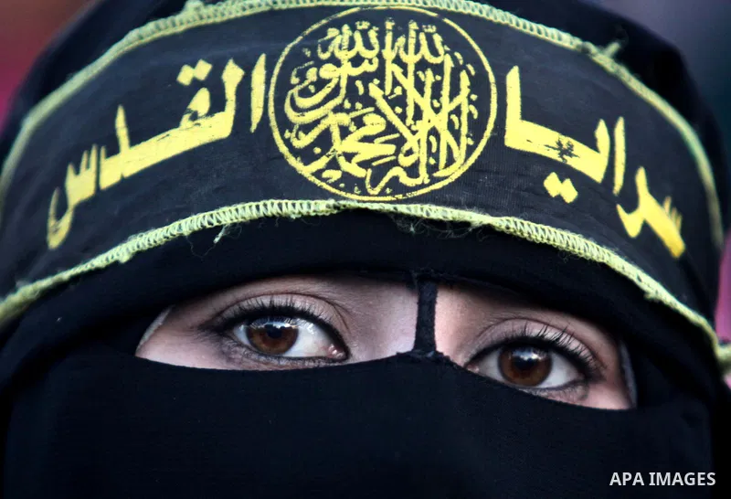 A Palestinian veiled woman who support Islamic Jihad movement attends a ceremony in solidarity with Jerusalem and against the recent visits by Jewish activists to al-Aqsa mosque, in Gaza city November 7, 2014. In recent...