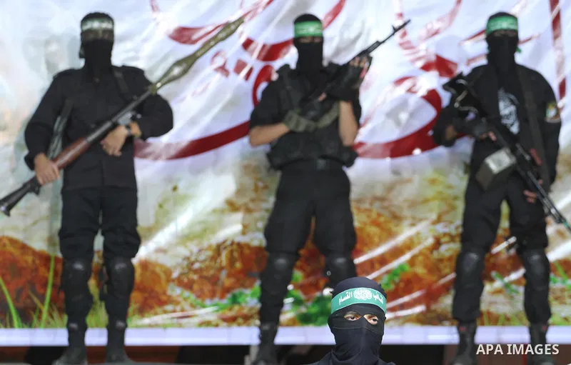 Palestinian members of Ezzedeen al-Qassam, the armed wing of Hamas movement, participate in a memorial service for the Palestinians who were killed during the seven-week Israeli offensive, in Gaza city November 7, 2014....