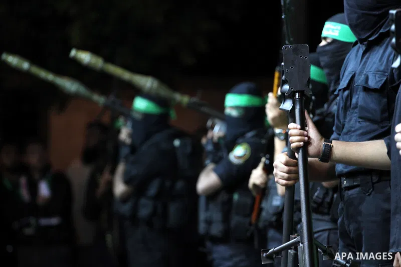 Palestinian members of Ezzedeen al-Qassam, the armed wing of Hamas movement, participate in a memorial service for the Palestinians who were killed during the seven-week Israeli offensive, in Gaza city November 7, 2014....