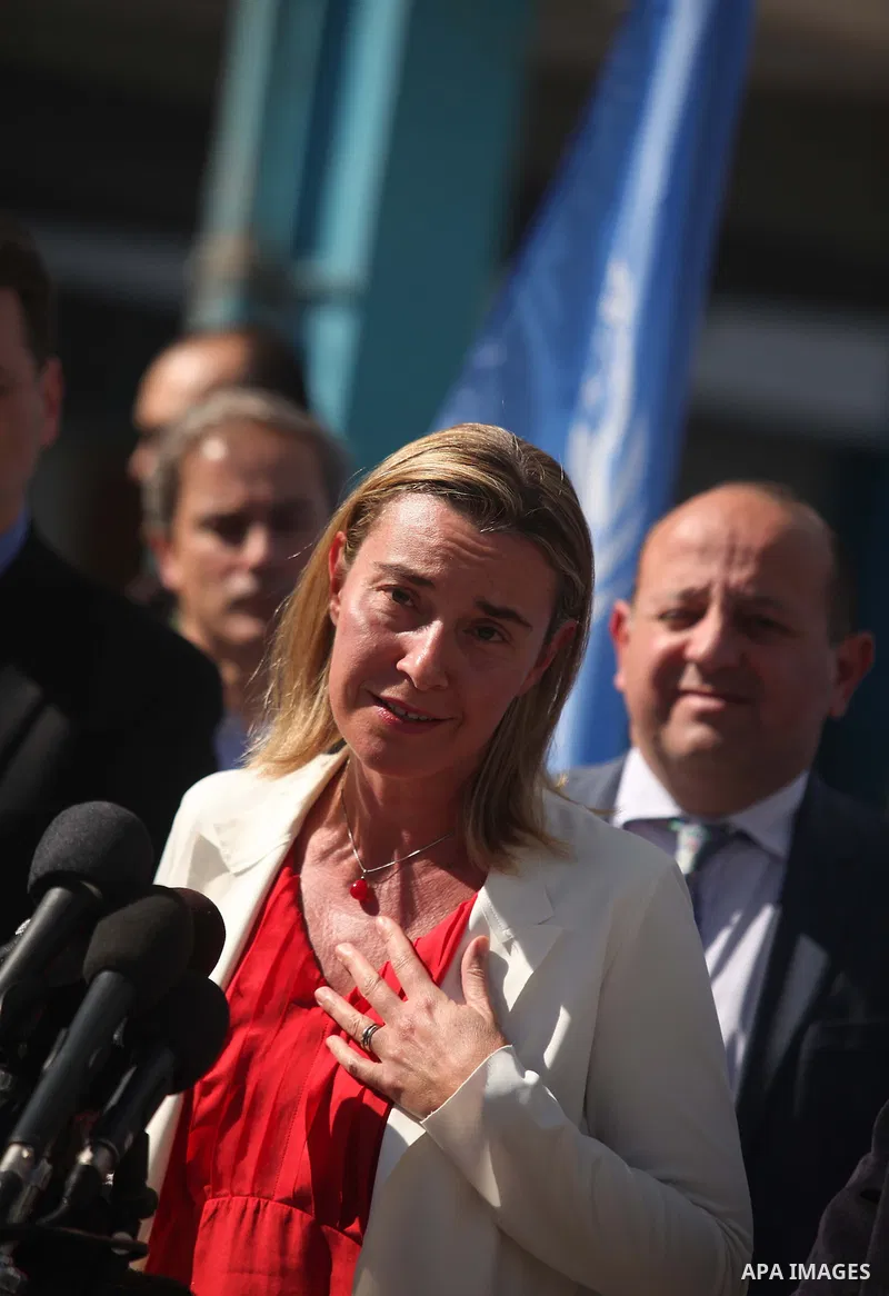 European Union foreign policy chief Federica Mogherini speaks during a press conference during her visiting a UN-run school sheltering Palestinians, whose houses were destroyed during the most recent conflict between Isr...