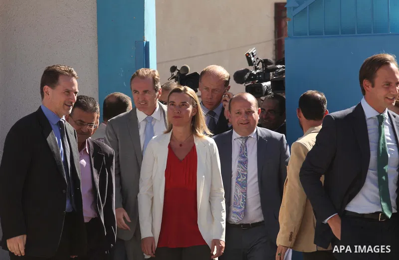 European Union foreign policy chief Federica Mogherini visits a UN-run school sheltering Palestinians, whose houses were destroyed during the most recent conflict between Israel and Hamas, in Gaza City November 8, 2014....