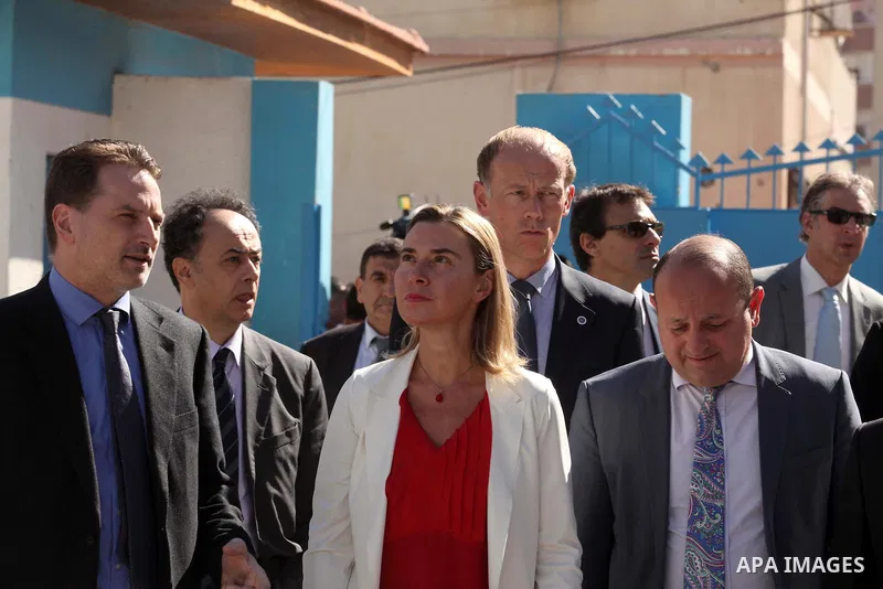 European Union foreign policy chief Federica Mogherini visits a UN-run school sheltering Palestinians, whose houses were destroyed during the most recent conflict between Israel and Hamas, in Gaza City November 8, 2014....