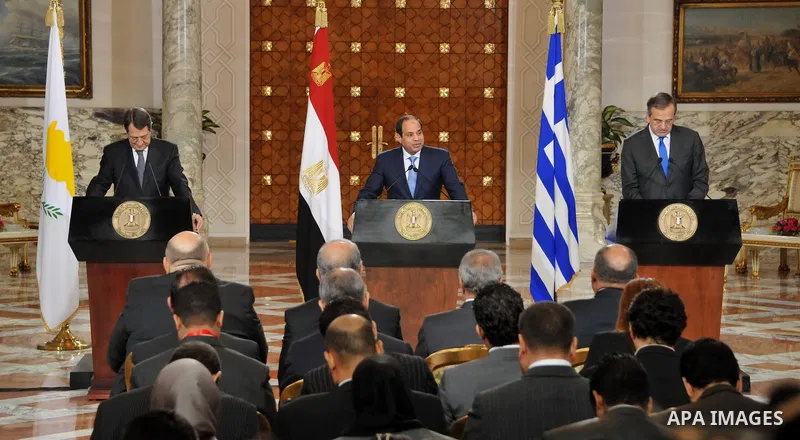 A handout picture released by the Egyptian Presidency shows Egypt's President Abdel Fattah al-Sisi speaks during a news conference with Cyprus' President Nicos Anastasiades and Greek Prime Minister Antonis Samaras after...