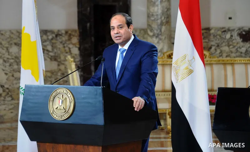A handout picture released by the Egyptian Presidency shows Egypt's President Abdel Fattah al-Sisi speaks during a news conference with Cyprus' President Nicos Anastasiades and Greek Prime Minister Antonis Samaras after...