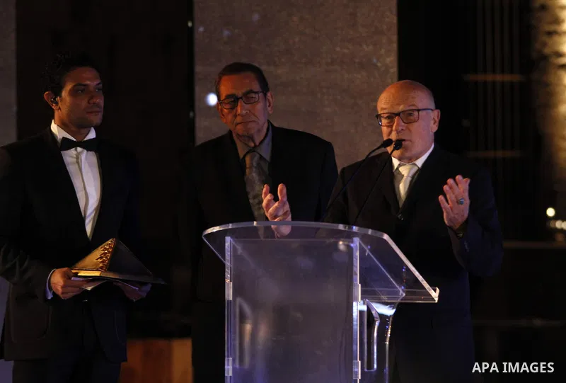 German director Volker Schloendorff speaks during the opening ceremony of the 36th Cairo International Film Festival in the Egyptian capital on November 9, 2014. Photo by Amr Sayed