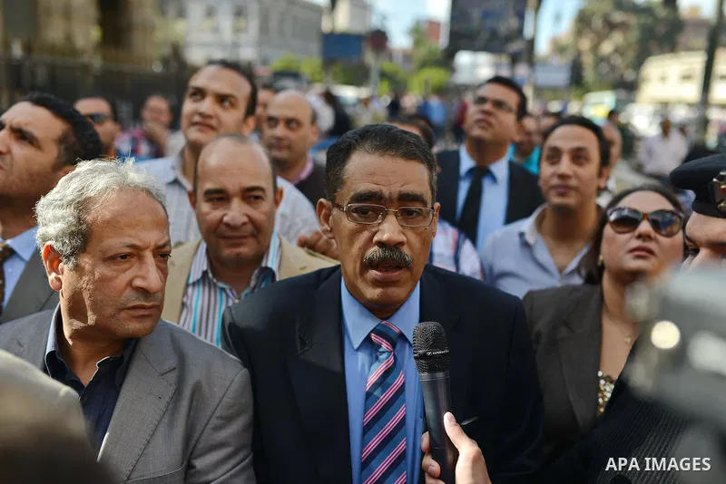 Egyptian Journalists take part in a protest against the president of Zamalek club Murtada Mansour in front of the journalists' syndicate in Cairo, Egypt, 15 Nov. 2014. Photo by Amr Sayed