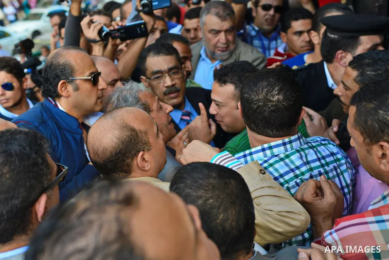 Egyptian Journalists take part in a protest against the president of Zamalek club Murtada Mansour in front of the journalists' syndicate in Cairo, Egypt, 15 Nov. 2014. Photo by Amr Sayed