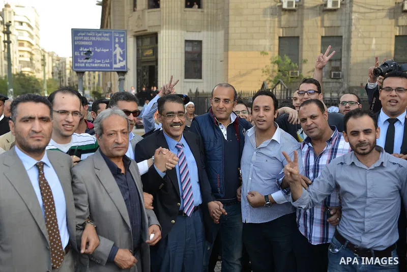 Egyptian Journalists take part in a protest against the president of Zamalek club Murtada Mansour in front of the journalists' syndicate in Cairo, Egypt, 15 Nov. 2014. Photo by Amr Sayed