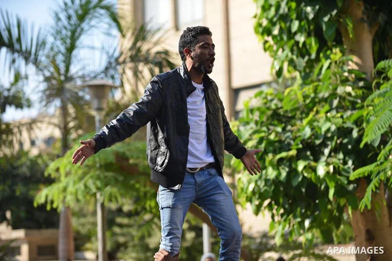 Egyptian students who support Muslim Brotherhood and ousted president Mohammed Morsi, take part in a demonstration to mark the World Student Day', in Cairo on November 17, 2014. The Students Against The Coup (SAC) moveme...