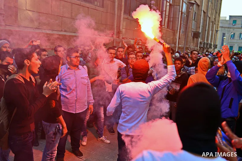 Egyptian students who support Muslim Brotherhood and ousted president Mohammed Morsi, take part in a demonstration to mark the World Student Day', in Cairo on November 17, 2014. The Students Against The Coup (SAC) moveme...