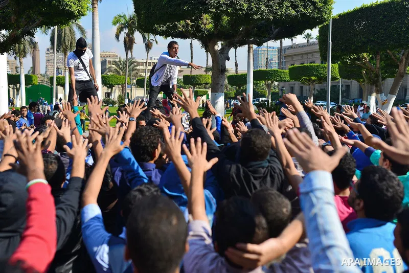 Egyptian students who support Muslim Brotherhood and ousted president Mohammed Morsi, take part in a demonstration to mark the World Student Day', in Cairo on November 17, 2014. The Students Against The Coup (SAC) moveme...