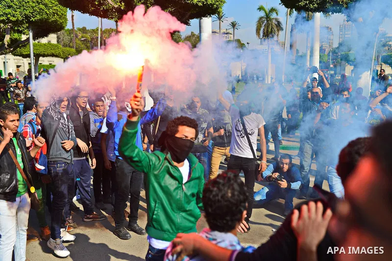Egyptian students who support Muslim Brotherhood and ousted president Mohammed Morsi, take part in a demonstration to mark the World Student Day', in Cairo on November 17, 2014. The Students Against The Coup (SAC) moveme...