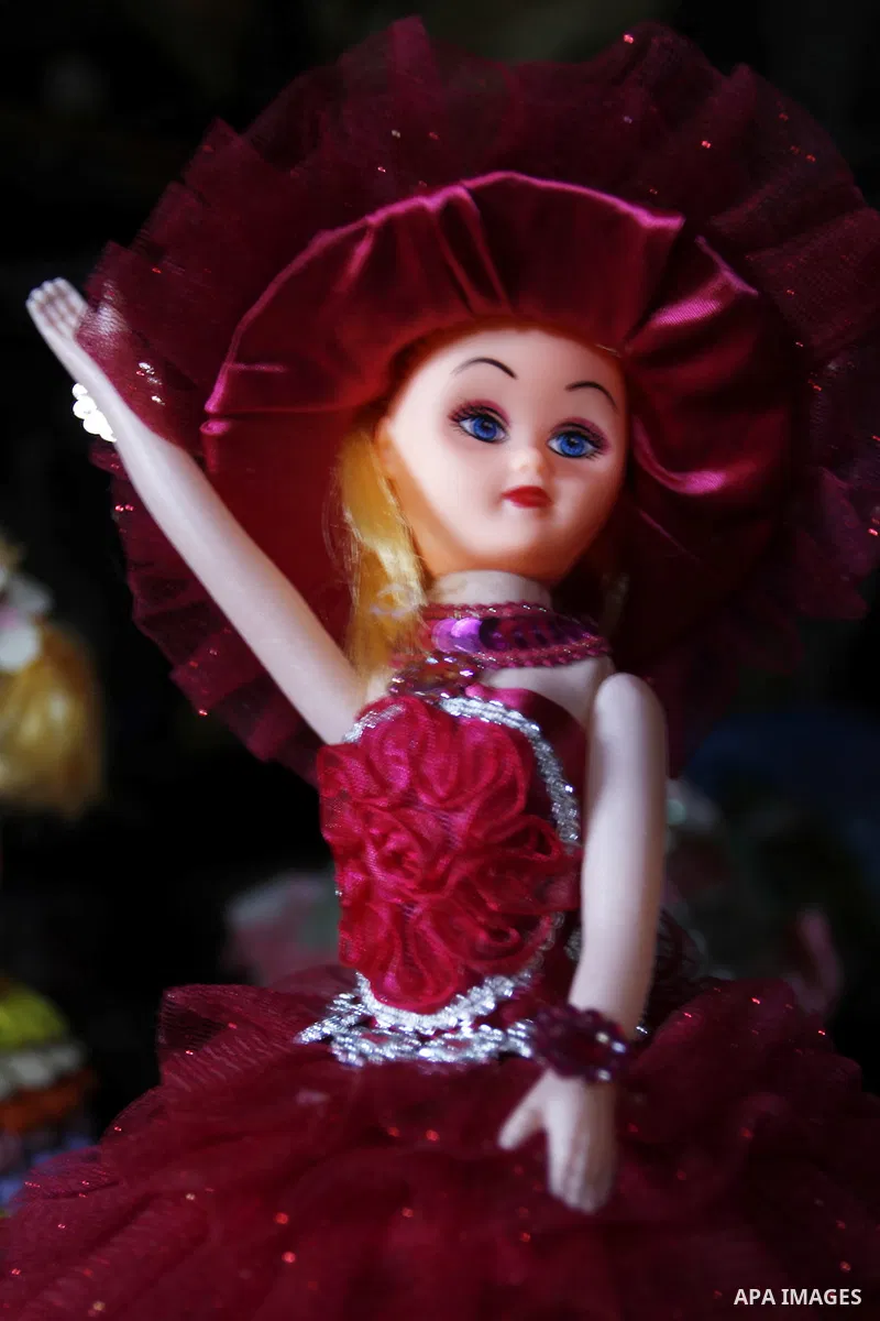 A handmade doll, made by 38 year-old Palestinian, Nesreen Abu Louz, is displayed at her home in Khan Younis, in the southern Gaza Strip, November 19, 2014. Abu Louz make different toys of dolls and cardboard models from...