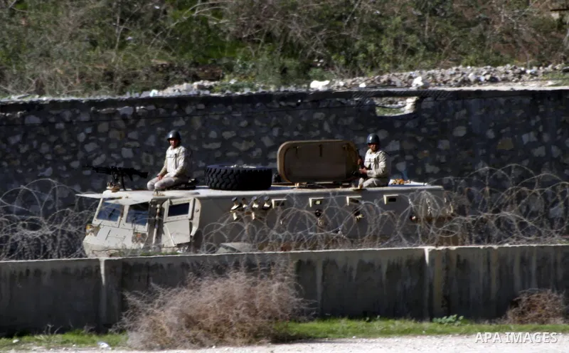 Egyptian security forces patrol during a military operation by Egyptian security forces in the Egyptian city of Rafah near the border with southern Gaza Strip on November 20, 2014. Egypt is set to expand the buffer zone...